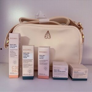 Biossance Skincare Set with Cream and Pink Packaging